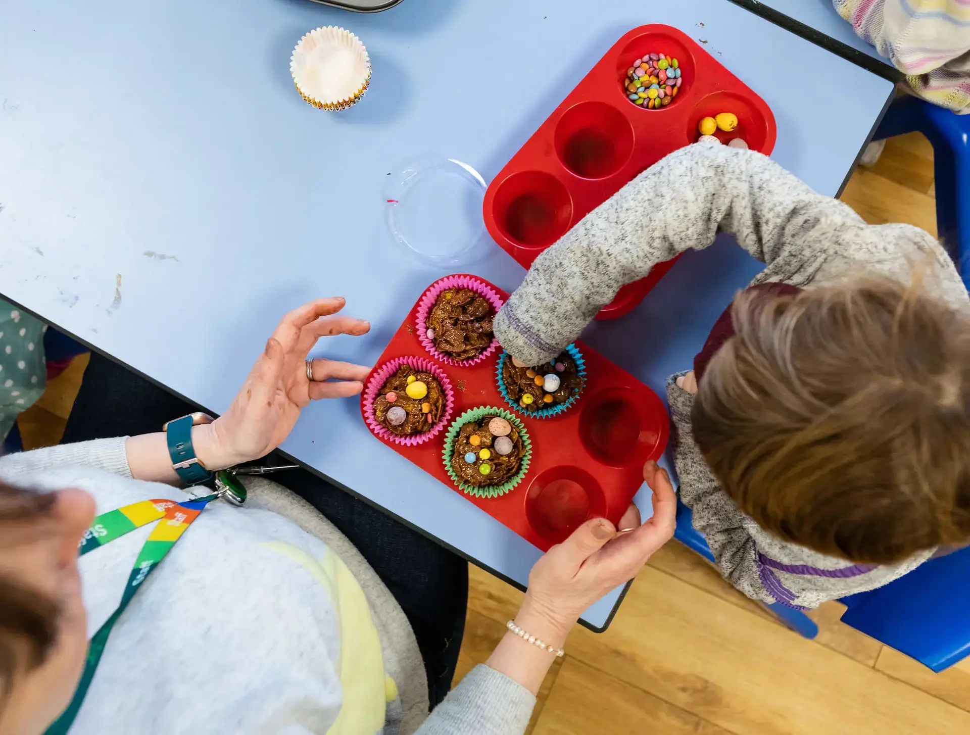 St Chris pupil making cakes with teacher